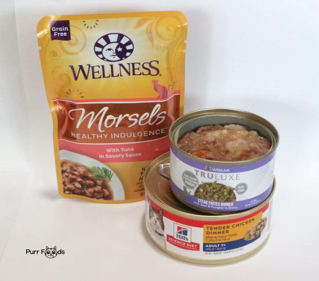 Wellness, Weruva, and Hills cat food cans that are low in phosphorus