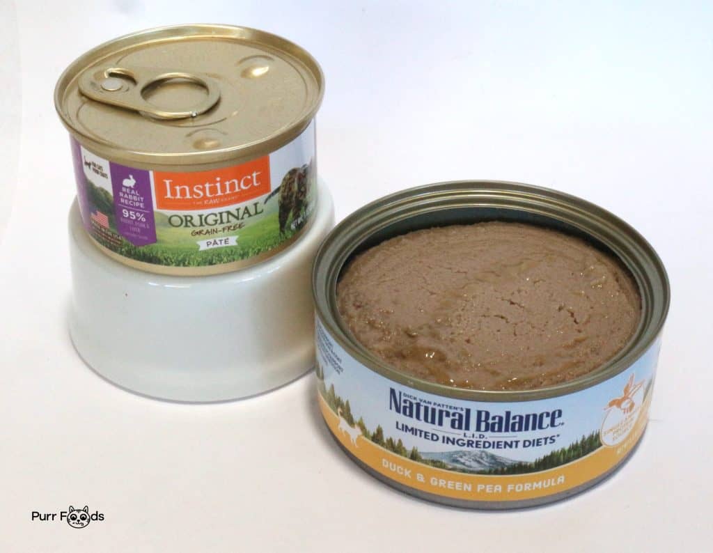 Instinct and Natural Balance cat food cans for hypoallergic cats, opened cans