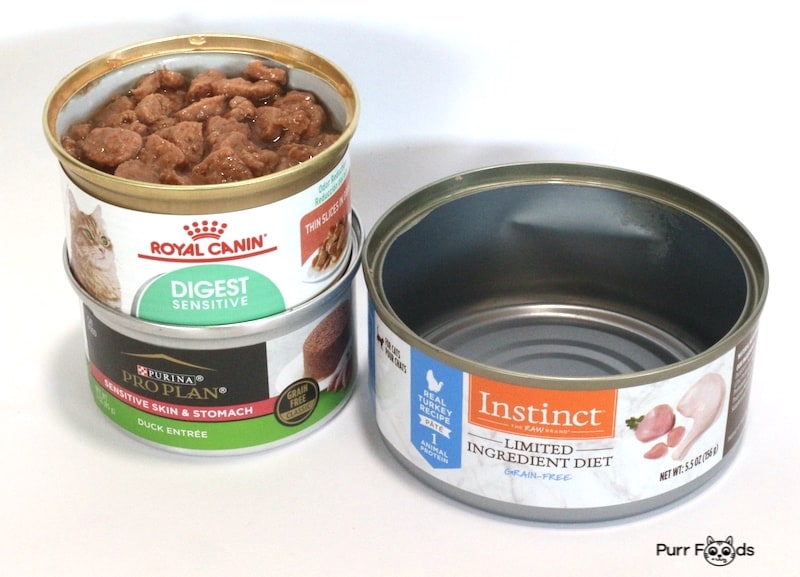 Royal Canin, Purina and Instinct cat food cans for sensitive stomach cats